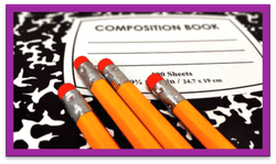 Pencils on top of a notebook