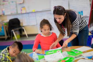 Photo of teacher engaging in formative assessment