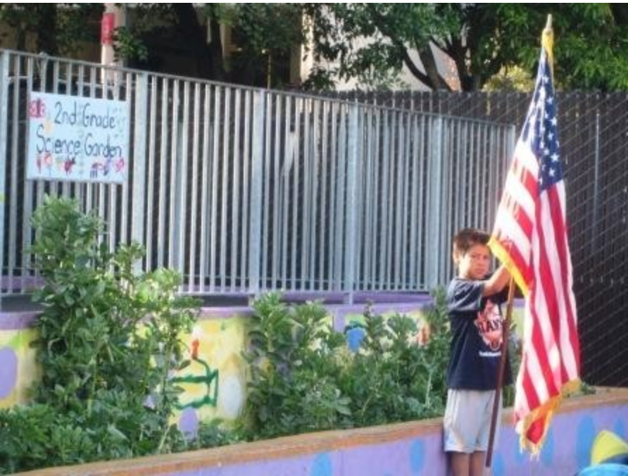 Student holding flag