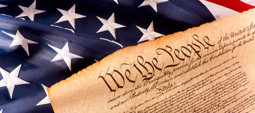 United States flag with Constitution