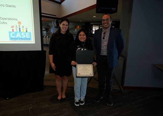 Galileo senior Katelyn A. receiving her CASE Study diploma from Meghan Jones, the Chicago Cubs Director of Baseball Operations, Administration & Strategy, and the San Francisco Giants President of Baseball Operations, Farhan Zaidi.