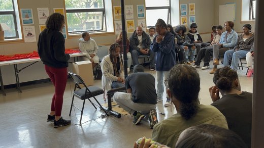 Black Star Rising Freedom Academy students demonstrate the specifications and durability of their moonbases.