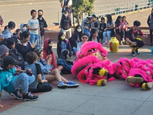students at after school dragon presentation