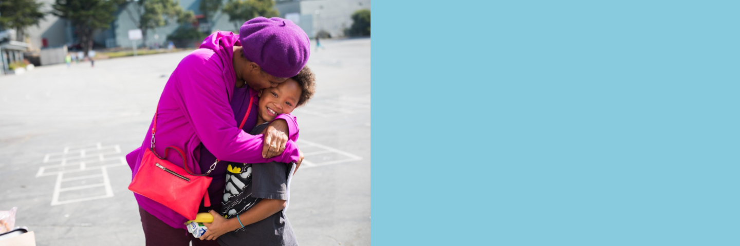 Woman hugging child