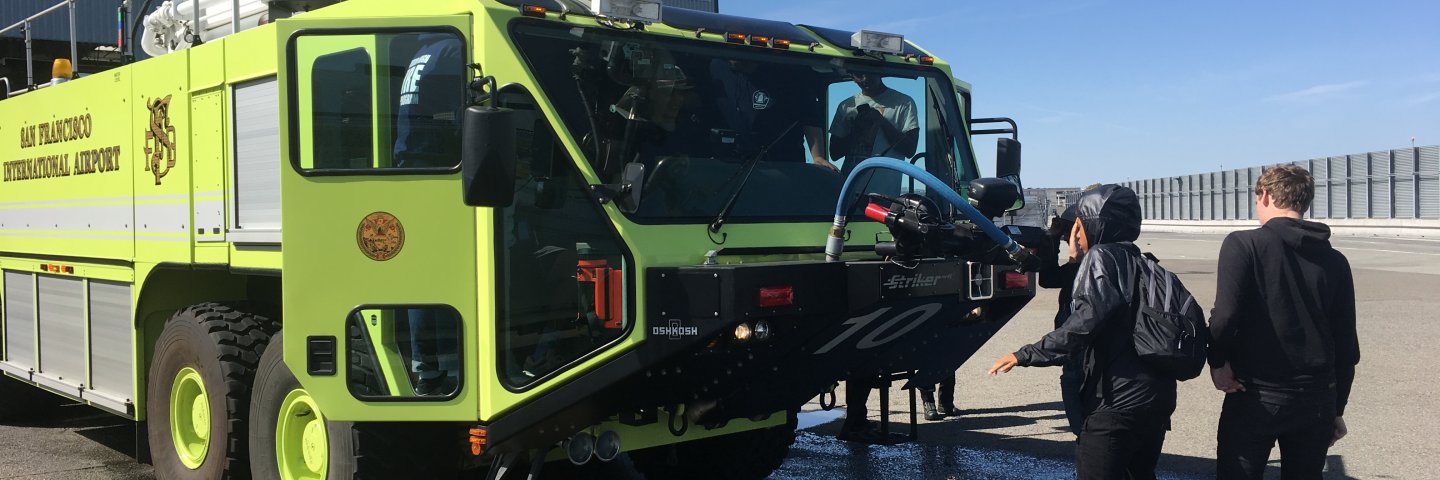 Students attend a firefighter event at SFO. 