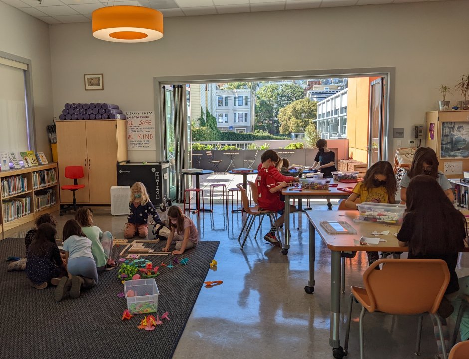 Students in library at recess