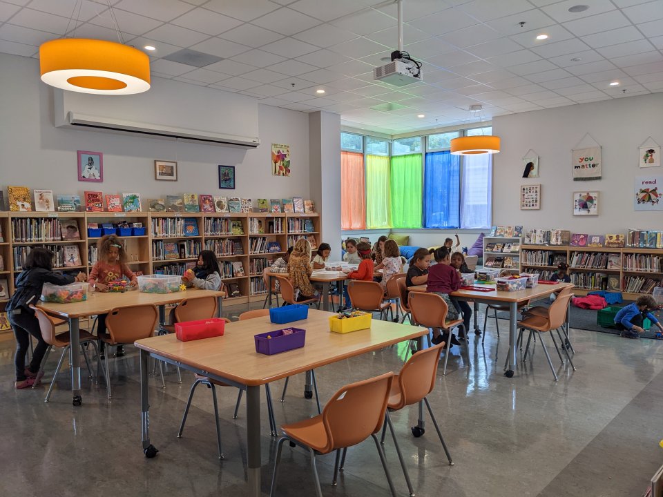 Students in the library at recess