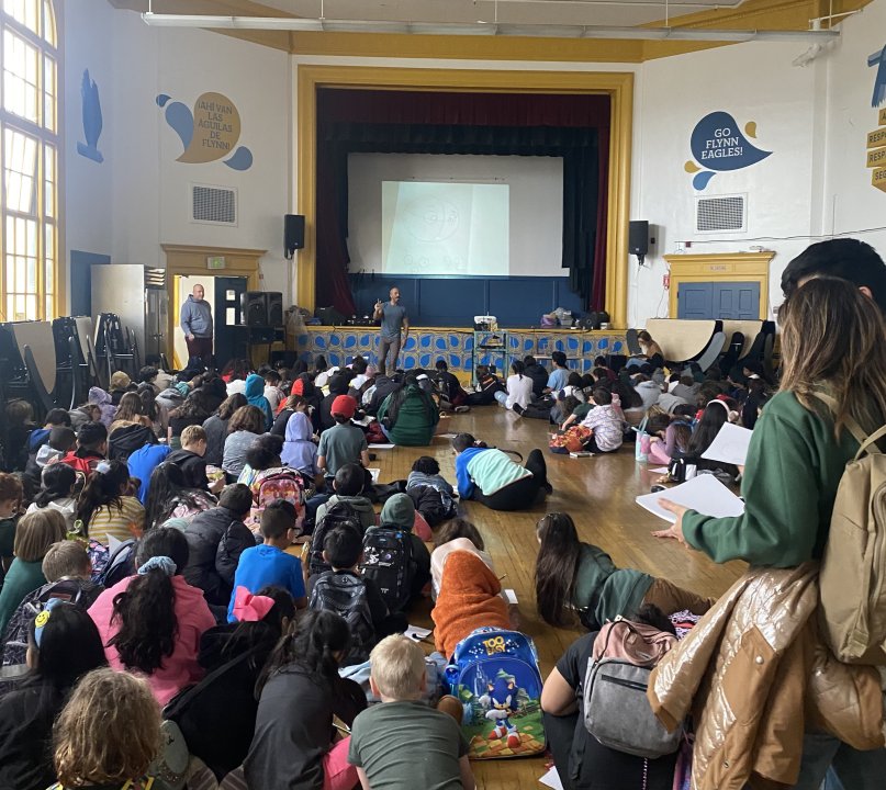 sirron norris, local artist giving presentation to flynn students in cafeteria