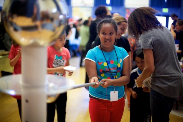Girl participating in science experiment