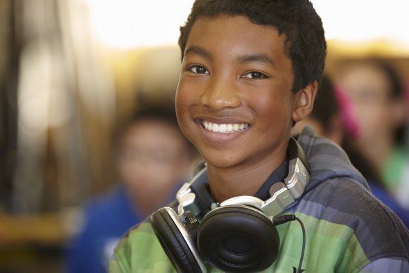 Student with headphones around his neck