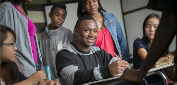 students studying and smiling