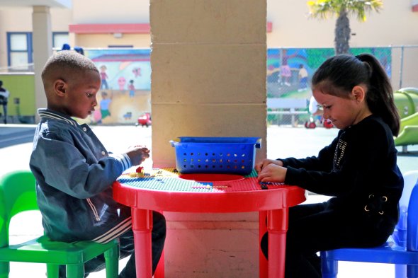 Students playing with legos 