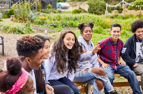 students talking outside