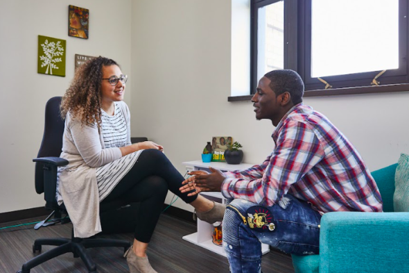 social worker talking with a student