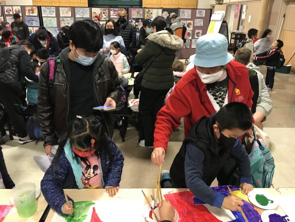 Parents with children making art