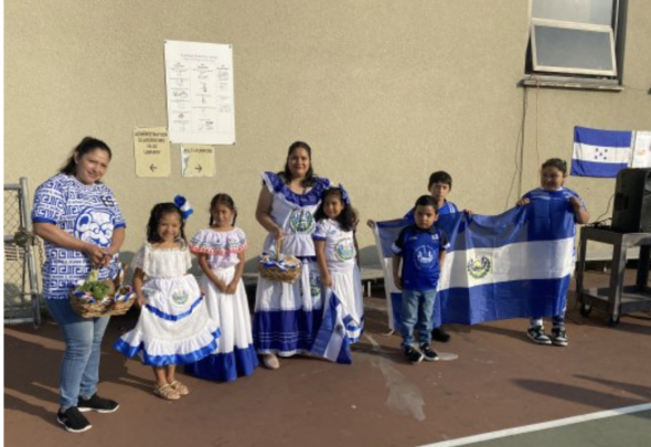 Mothers and students dressed in typical clothes from Latin American Country
