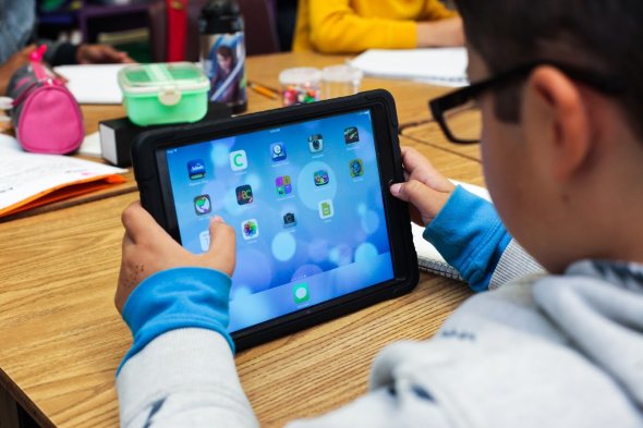 kid with tablet