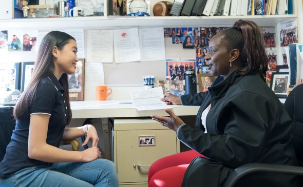 Student receiving counseling from staff person