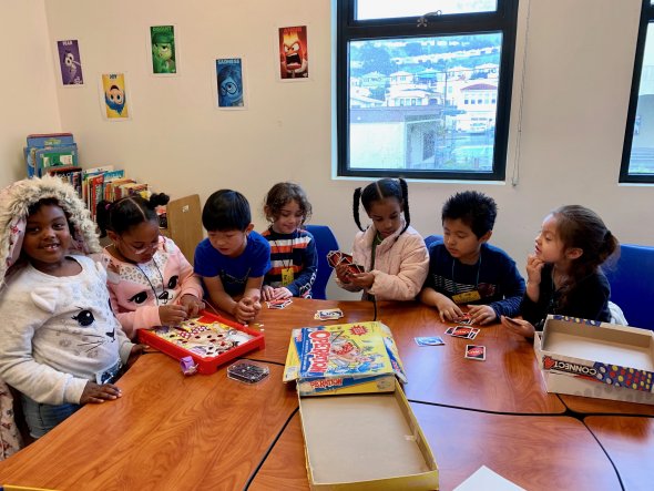Kids playing board games in Gallopers