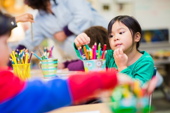 Student choosing a color pencil