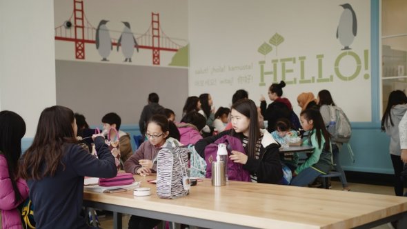 Students eating lunch in cafeteria