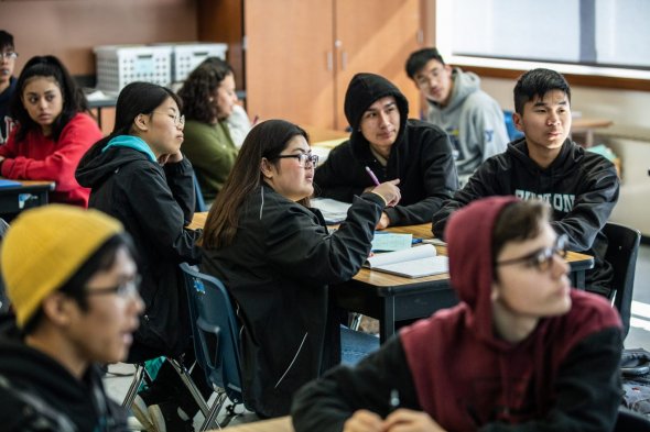 Burton students participate in math class.