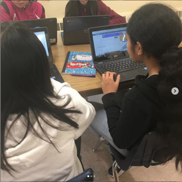 VVMS students working with laptops