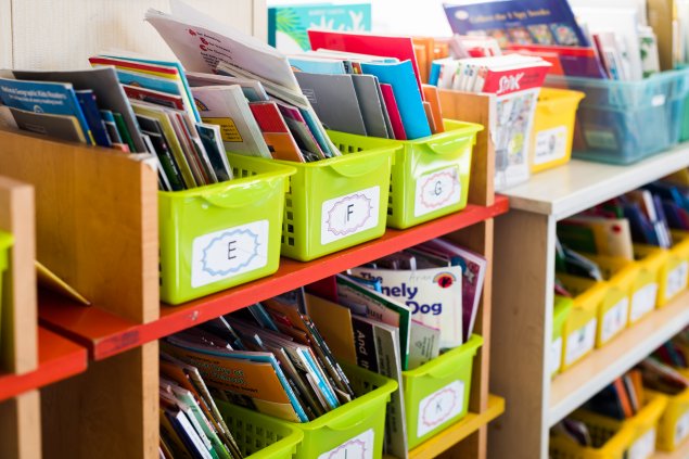 Bookshelf of picture books sorted by alphabet letter