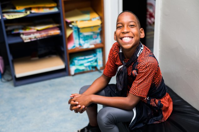 Elementary student smiling