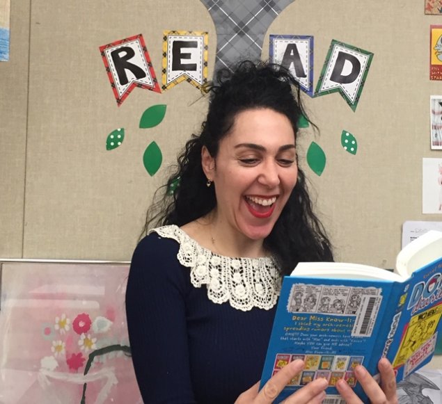 Carver teacher librarian reading book