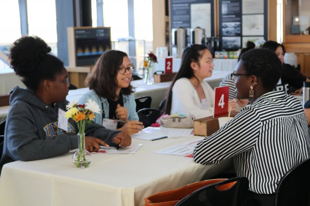 Students interview a professional about public health. 