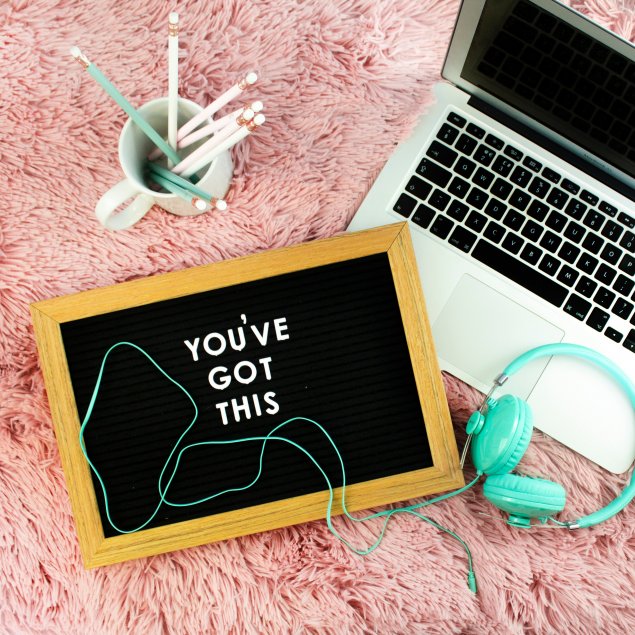 A laptop with a sign that reads you've got this.