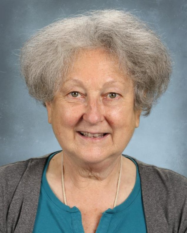 headshot with a light grey background