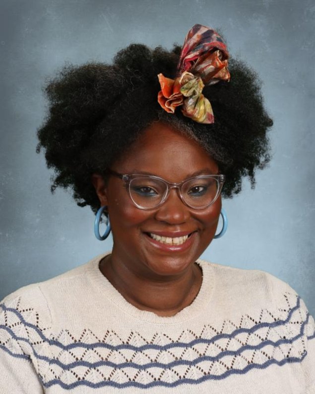 headshot with a light grey background
