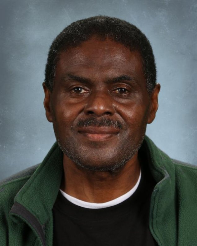 headshot with a light grey background
