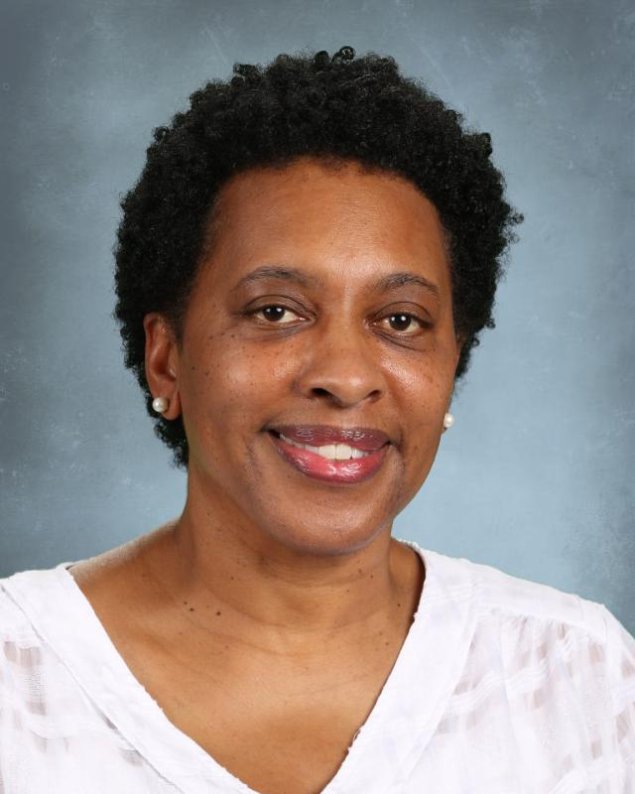 headshot with a light grey background