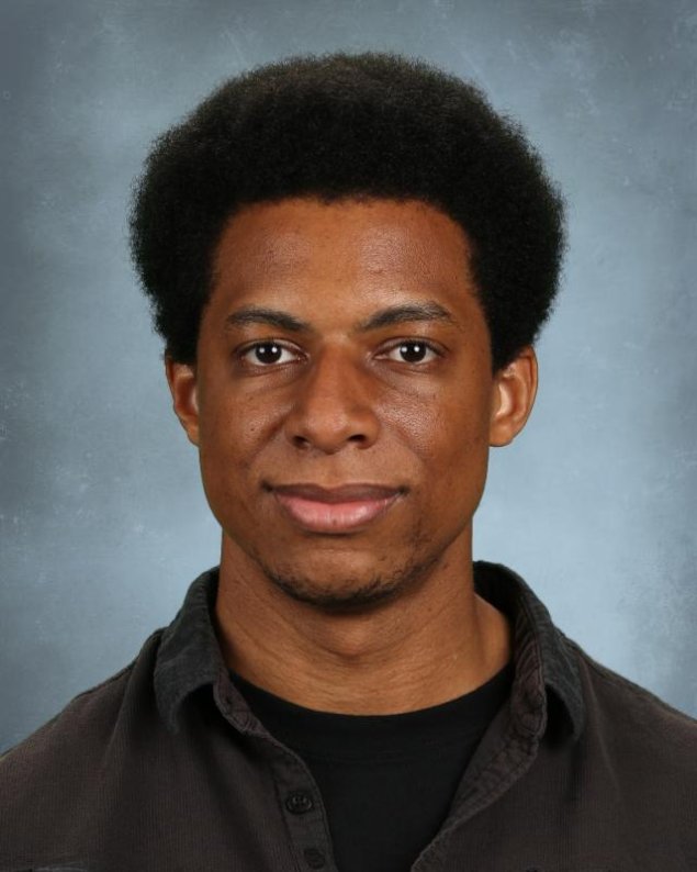headshot with a light grey background