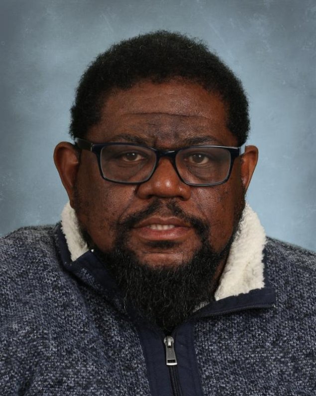 headshot with a light grey background