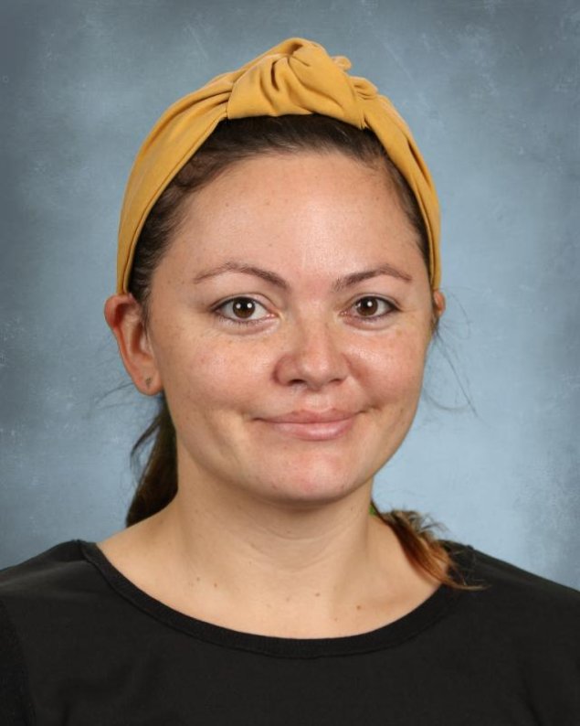 headshot with a light grey background