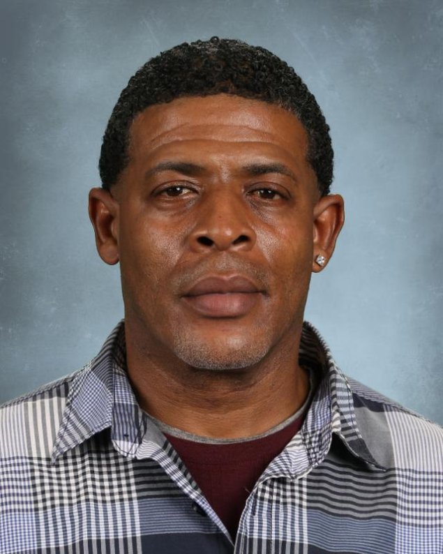 headshot with a light grey background