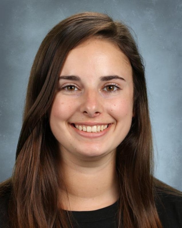headshot with a light grey background