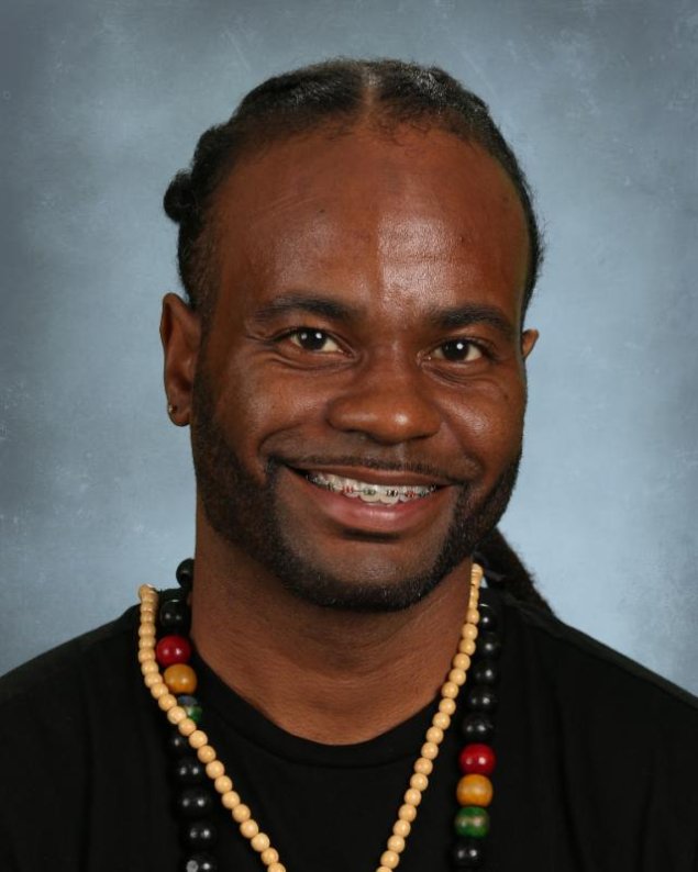 headshot with a light grey background
