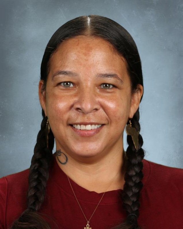 headshot with a light grey background