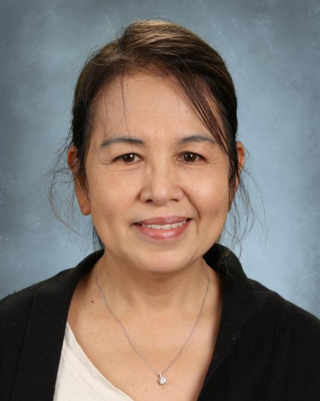 headshot with a light grey background