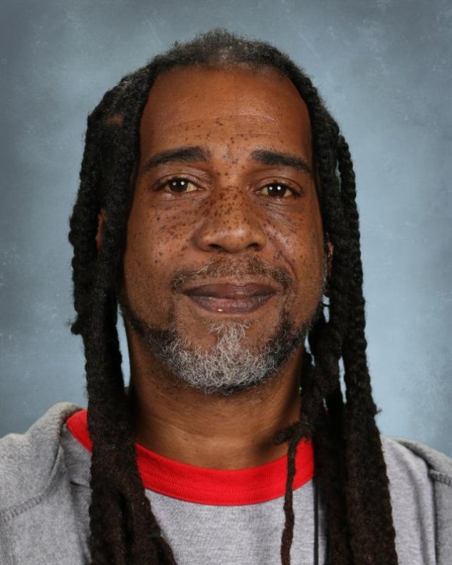 headshot with a light grey background