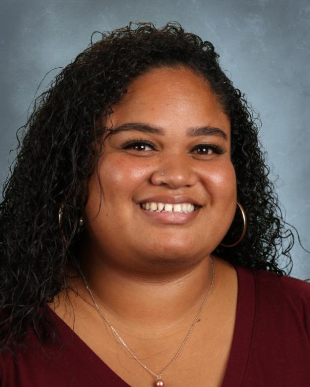 headshot with a light grey background