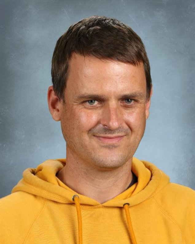 headshot with a light grey background
