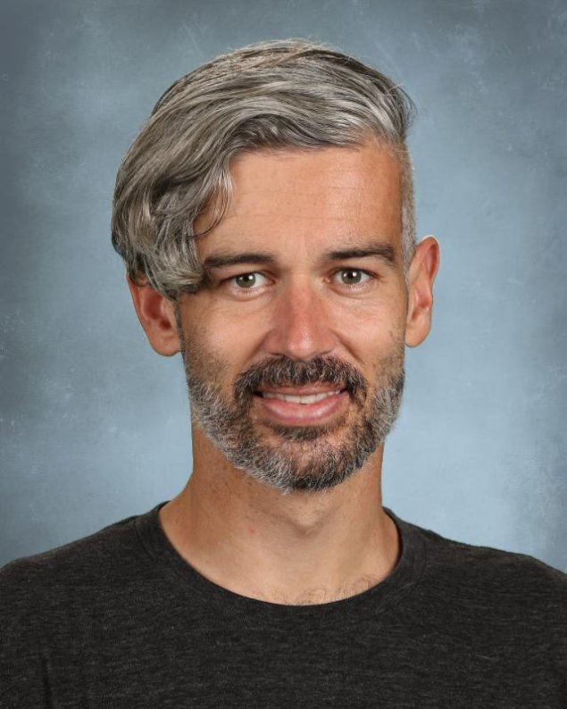 headshot with a light grey background