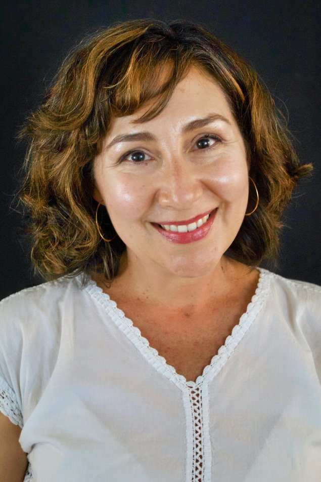 headshot with a dark grey background