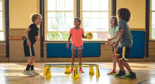 students playing spikeball